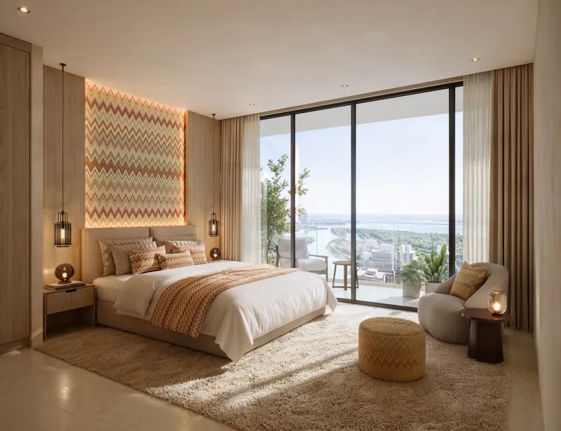 Bedroom with Missoni zigzag headboard panel and floor-to-ceiling windows over the canal and sea